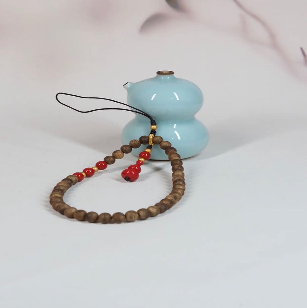 "HongFu"— A Grade 6mm Natural Green Kynam Agarwood Phone Charm