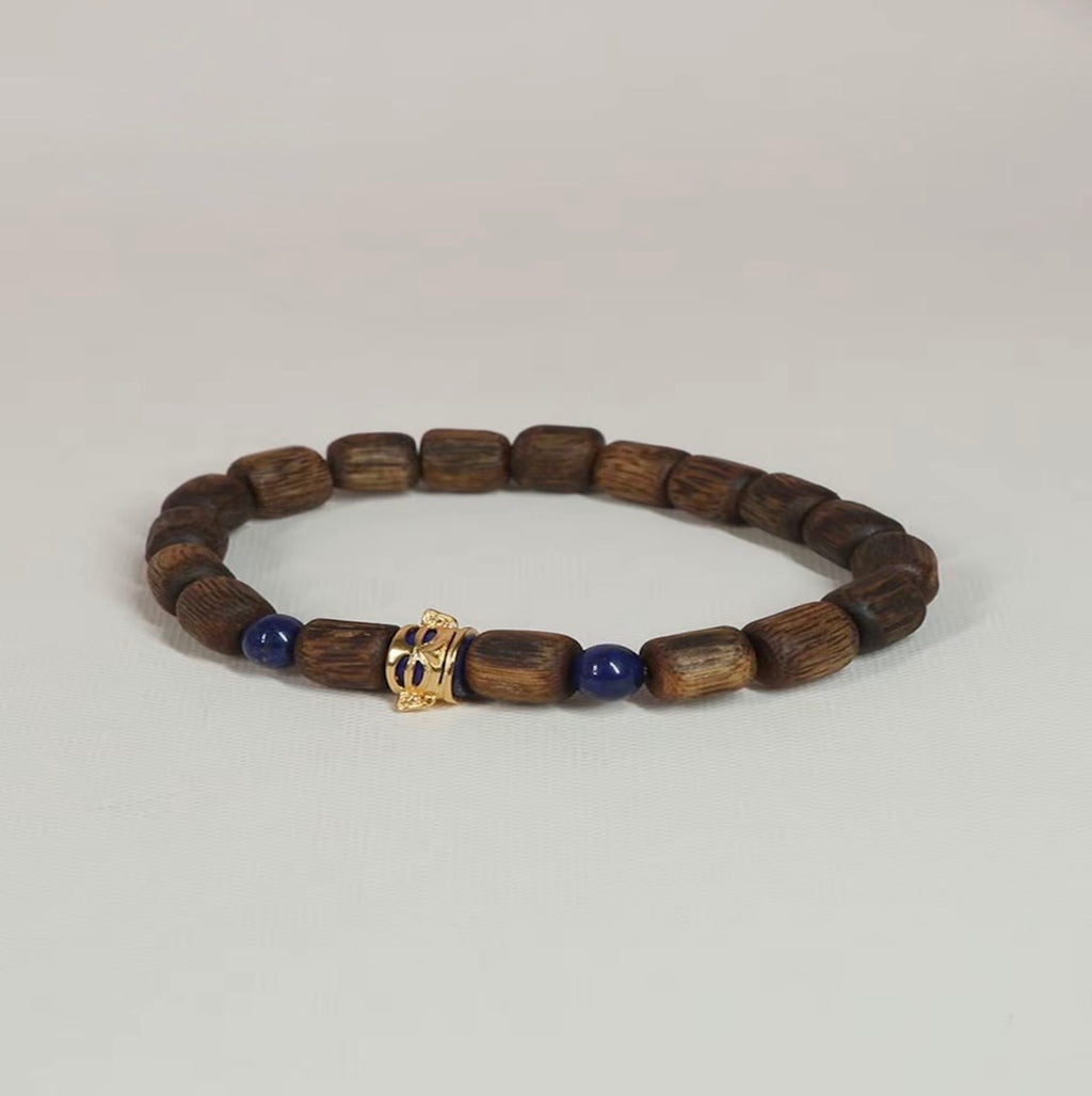 “Sanxingdui” S-Grade Green Kynam Bracelet — 8mm Sculpted Barrel Beads