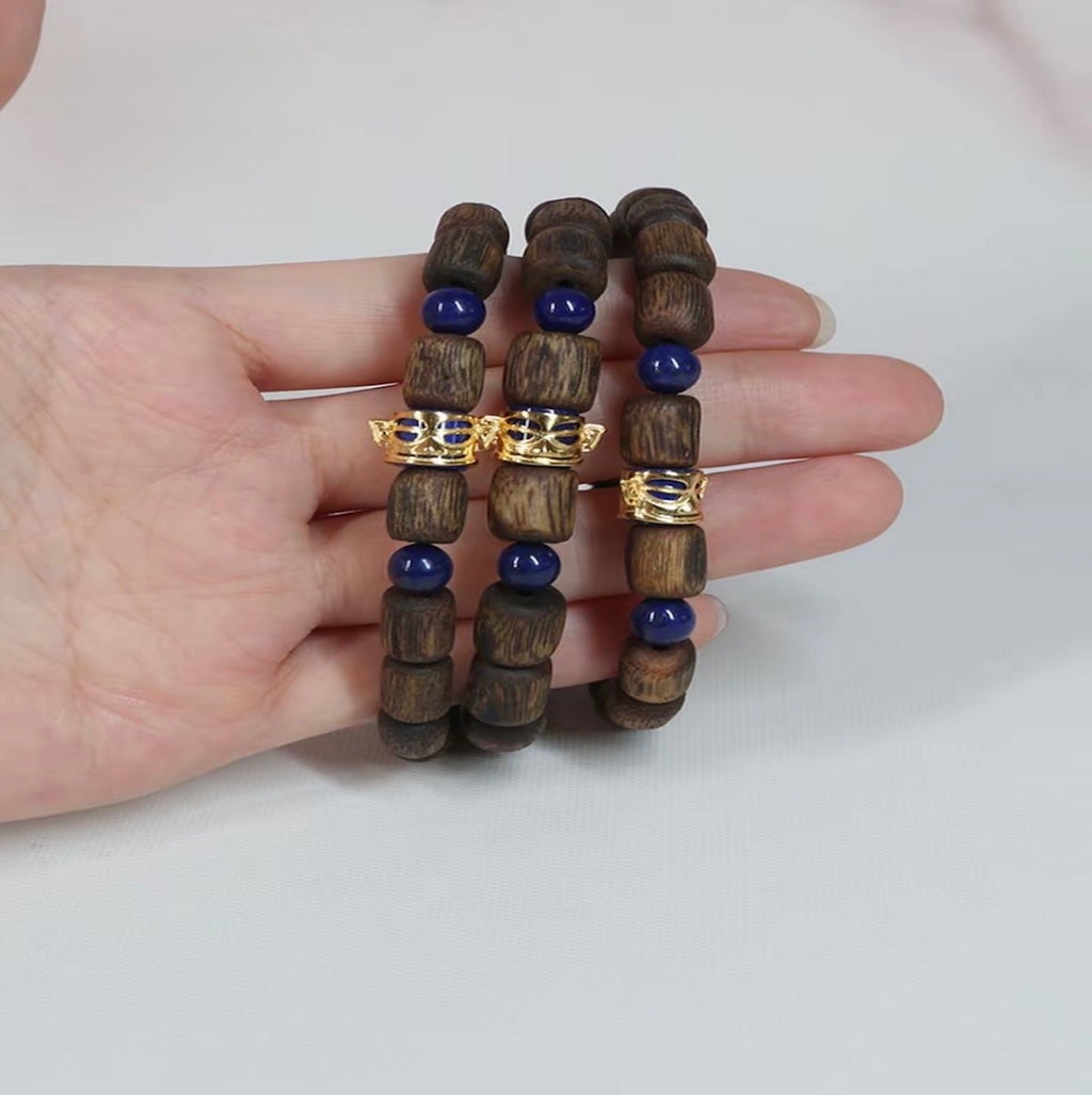 “Sanxingdui” S-Grade Green Kynam Bracelet — 8mm Sculpted Barrel Beads
